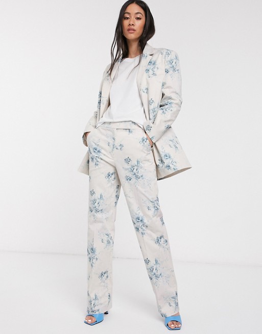 ASOS DESIGN wide leg suit trousers in white based floral