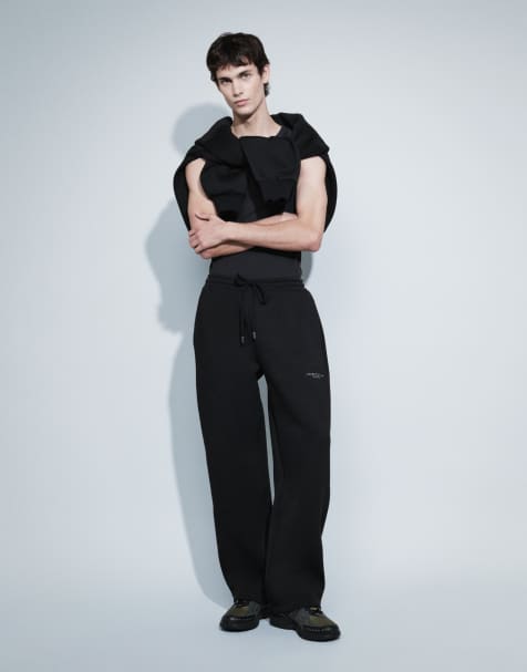 ASOS DESIGN wide leg sweatpants with embroidery in black scuba-style fabric - view 1