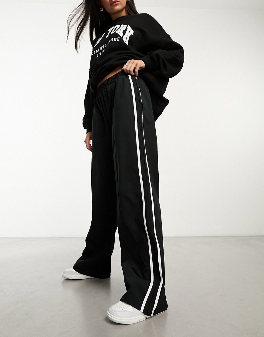wide leg sweatpants with side stripe in black
