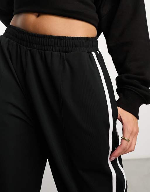 ASOS DESIGN wide leg sweatpants with side stripe in black