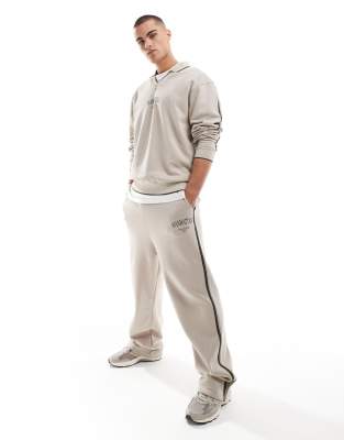 Asos Design Wide Leg Sweatpants With Side Taping And City Print In Stone-neutral