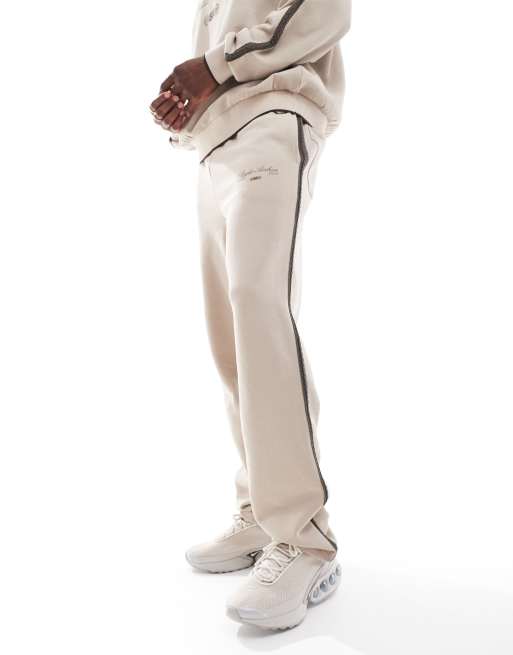 ASOS DESIGN wide leg sweatpants with taping detail in beige, 2 of 5