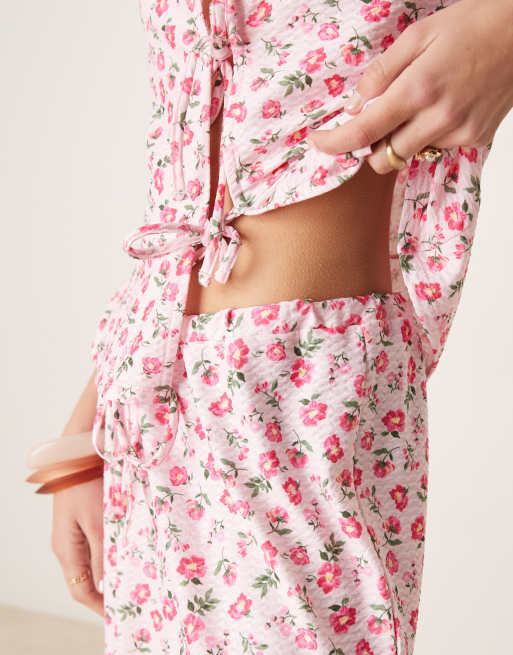 ASOS DESIGN wide leg tie front pants in pink ditsy floral