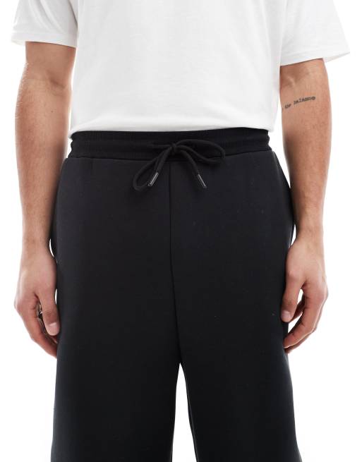 ASOS DESIGN wide leg trackies in black (part of a set), 4 of 5