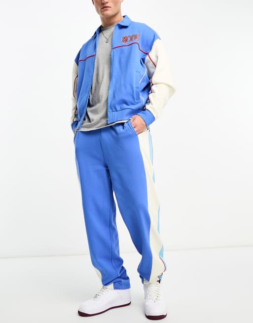 ASOS DESIGN wide leg trackies in blue colour block (part of a set)