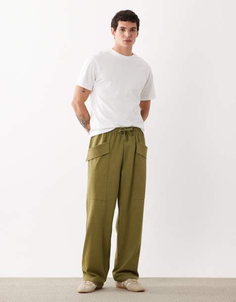 ASOS DESIGN wide leg trackies with cargo pockets in green - view 1