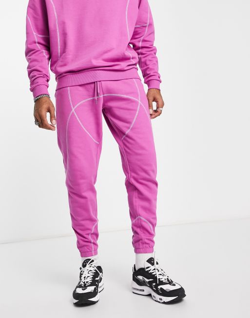 ASOS DESIGN wide leg trackies with contrast stitching in purple (part of a set)