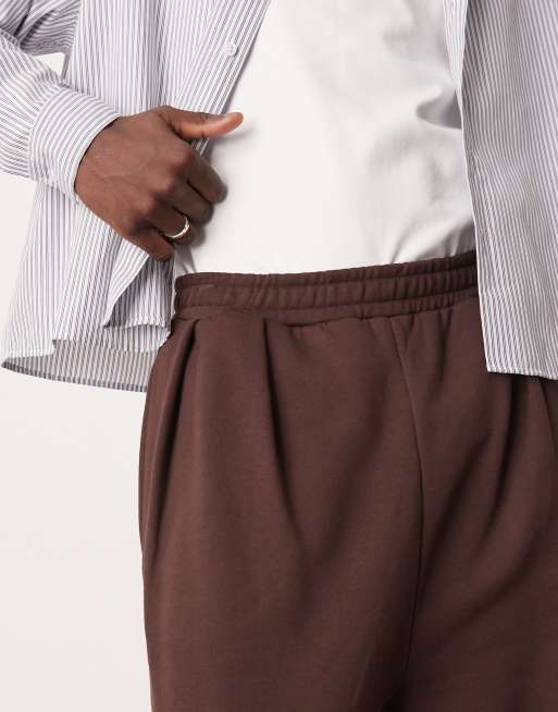 ASOS DESIGN wide leg trackies with front pleat in dark brown | ASOS
