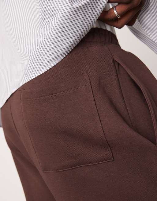 ASOS DESIGN wide leg trackies with front pleat in dark brown | ASOS