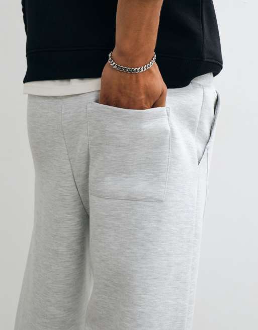 ASOS DESIGN wide leg trackies with twisted seam in scuba-style fabric in grey, 4 of 5