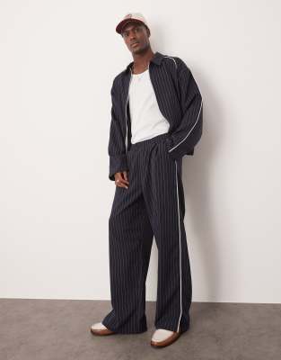 ASOS DESIGN wide leg tracksuit bottoms in navy - part of a set