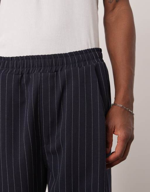 ASOS DESIGN wide leg tracksuit bottoms in navy - part of a set