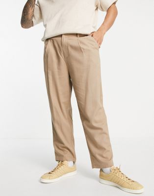 ASOS DESIGN wide leg trousers with pleats in beige linen mix | ASOS