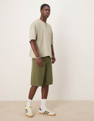 asos ASOS DESIGN wide longline herringbone shorts in green