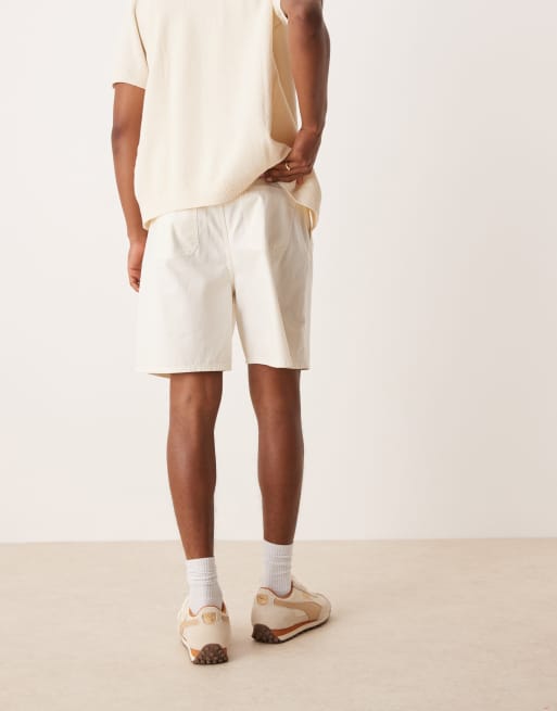 ASOS DESIGN wide mid length pleated shorts with drawstring in white