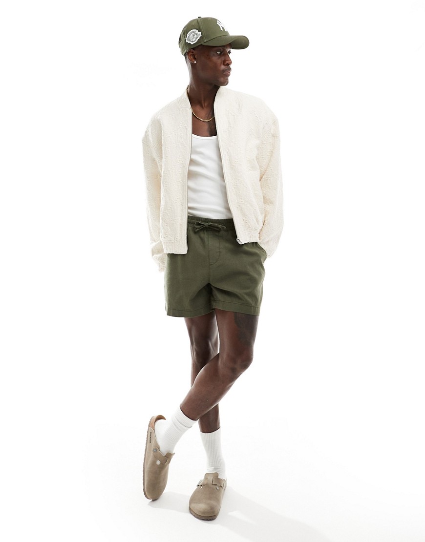 Asos Design Wide Shorter Length Linen Shorts With Elasticized Waist In Khaki-green