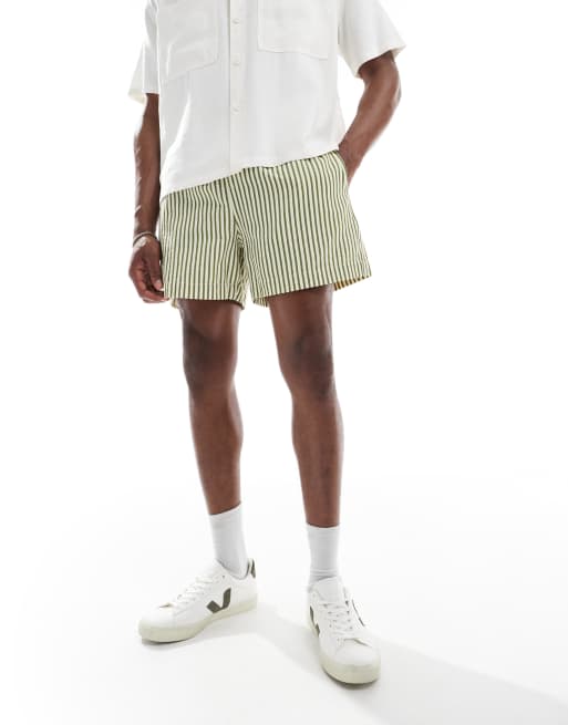 ASOS DESIGN – Kurz und weit geschnittene Shorts in Grün und Weiß gestreift