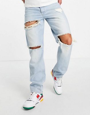 ASOS DESIGN wide straight leg jeans in 90's stone wash with rips-Blue