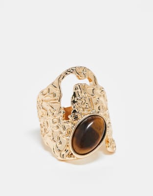 wide textured ring with semi precious style stone set in gold tone