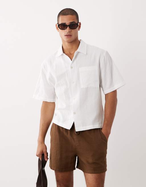 ASOS DESIGN wide textured short length shorts with elasticated waistband in brown, 2 of 5