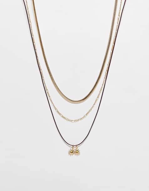 ASOS DESIGN – Wielopak naszyjników ze sznurka i łańcuszka z zawieszkami z motywami astrologicznymi w kolorze złota - view 1