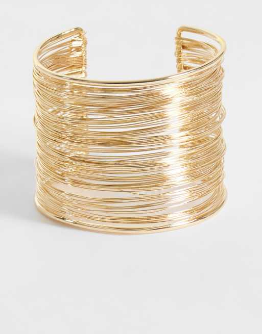 ASOS DESIGN wielorzędowe bransoletki mankietowe w złotym odcieniu, 3 z 5