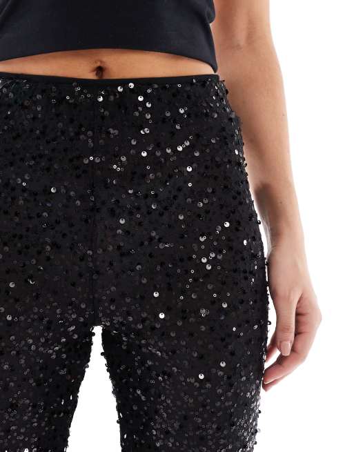 ASOS DESIGN - Wiggle - Pantaloni a zampa in rete trasparente nera con paillettes, 4 di 5