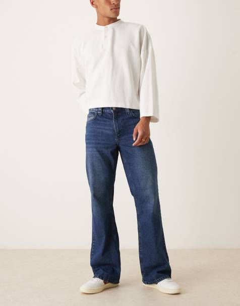 ASOS DESIGN - Wijd uitlopende jeans in blauw met donkere wassing - view 1