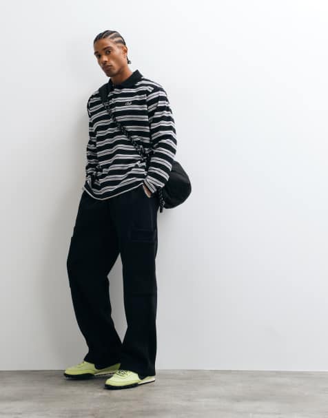 ASOS DESIGN wijde jogger met gelaagde cargozakken in gewassen zwart polykatoen - view 1