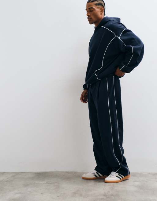 ASOS DESIGN wijde joggingbroek met witte bies in navy, 2 van 5