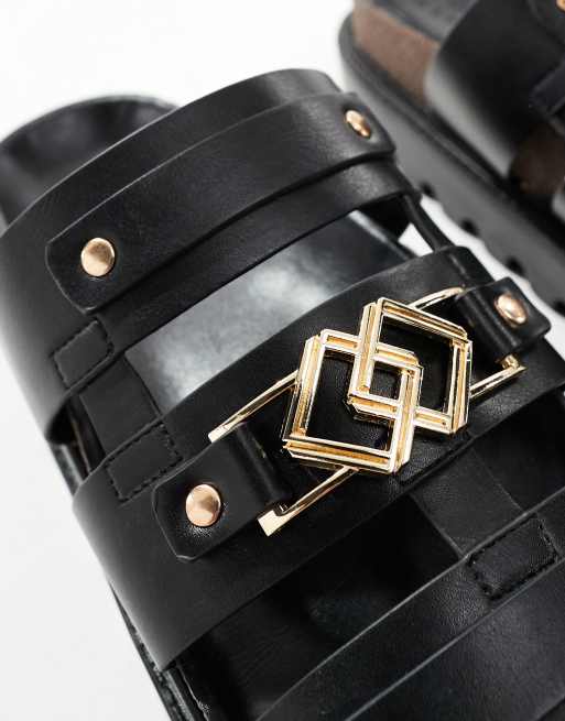ASOS DESIGN – Wildleder-Sandalen in Schwarz mit goldfarbenen Metalldetails und dicker Sohle, 3 von 4