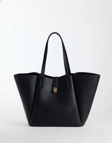 ASOS DESIGN winged tote bag with lock detail in black - view 1