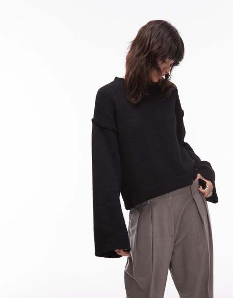 ASOS DESIGN wool blend knit sweater with exposed seams in black - view 1