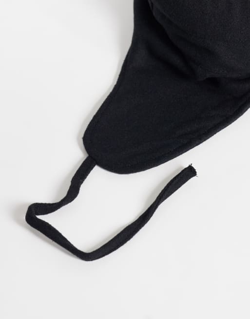 ASOS DESIGN wool look flat cap with ear flaps in black, 2 of 3
