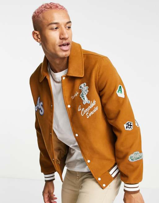 ASOS DESIGN oversized Harrington varsity jacket in mustard with badging