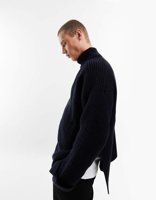 ASOS DESIGN wool mix rib jumper with roll neck in navy