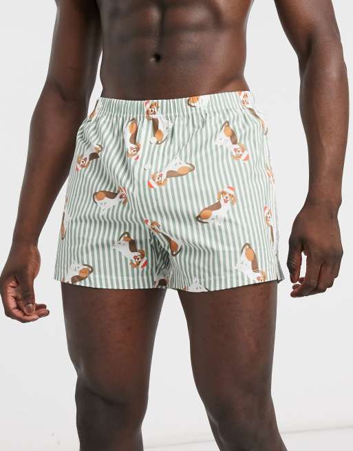 ASOS DESIGN woven boxers with festive dog and stripe print ASOS