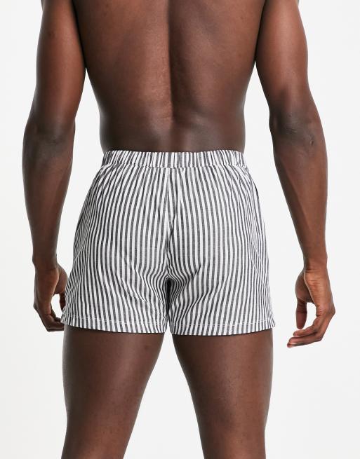 ASOS DESIGN woven boxers with spliced print | ASOS