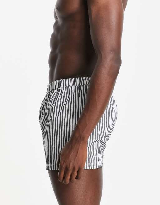 ASOS DESIGN woven boxers with spliced print | ASOS