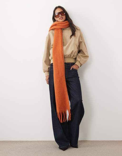 ASOS DESIGN woven fluffy tassel scarf in burnt orange, 2 of 3