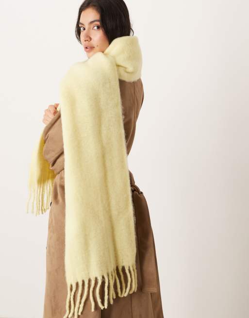 ASOS DESIGN woven fluffy tassel scarf in buttermilk yellow