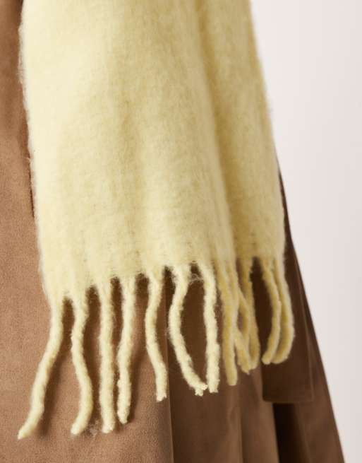 ASOS DESIGN woven fluffy tassel scarf in buttermilk yellow
