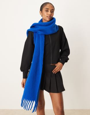 Asos Design Woven Fluffy Tassel Scarf In Blue