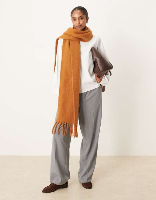 ASOS DESIGN woven fluffy tassel scarf in tabacco
