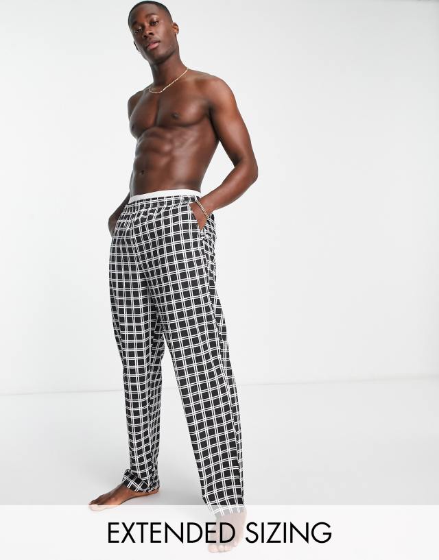 ASOS DESIGN woven lounge bottoms in black and white check