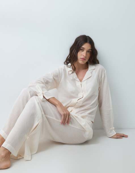 ASOS DESIGN woven modal long sleeve shirt and wide leg trouser pyjama set with satin frog tie detail in cream - view 1