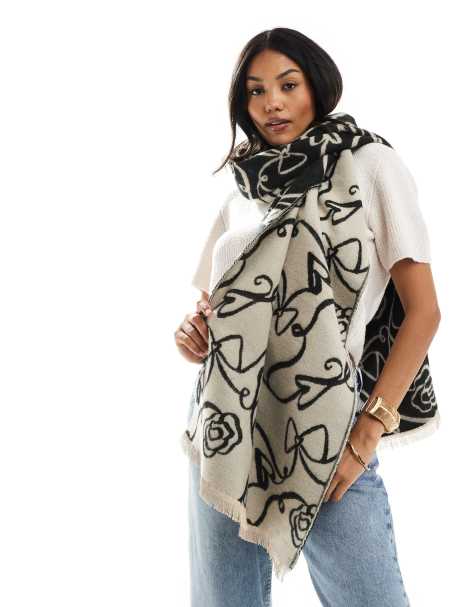 ASOS DESIGN woven scarf in abstract bow and flower jacquard in black and white - view 1