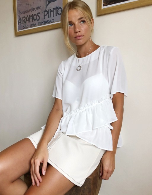 ASOS DESIGN woven t-shirt with ruffle hem in ivory