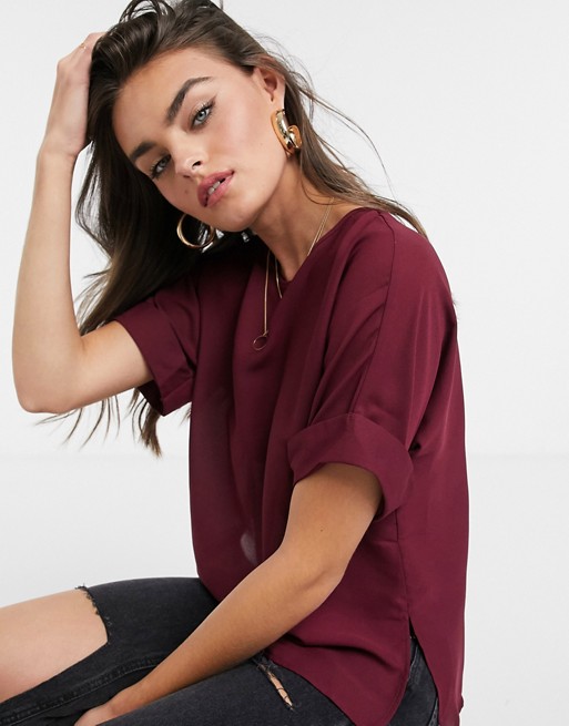 ASOS DESIGN oversized woven tee with roll sleeve in dark berry