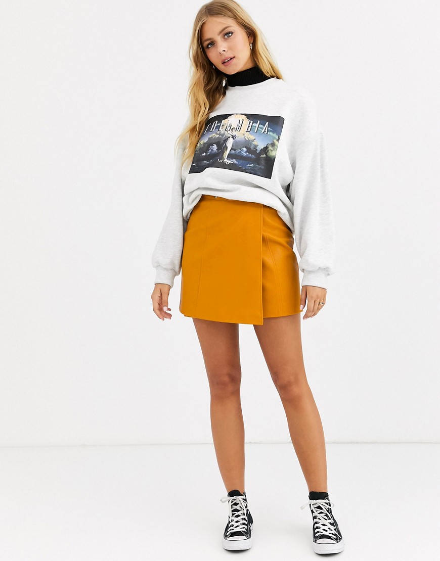 ASOS DESIGN wrap A line leather look mini skirt with snap buttons-Brown